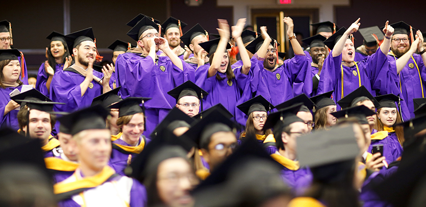 MMM graduates cheer during their Master's Degree Recognition Ceremony.