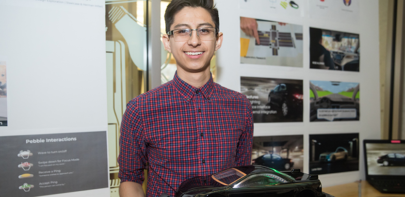 Ivan Eduardo Calvachi with his thesis project, Lume.