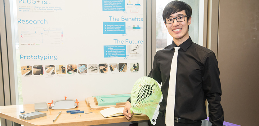 Joshua Kim with his thesis project, Plus +.