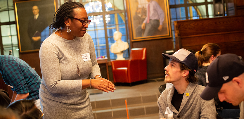 Uzoamaka Emeka Nzelibe, a Clinical Associate Professor at Northwestern Law, speaks to a student.