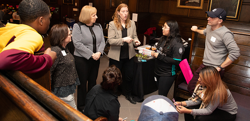 Alyson Carrel (center), Assistant Dean of Law and Technology Initiatives at Northwestern Law, speaks with students.