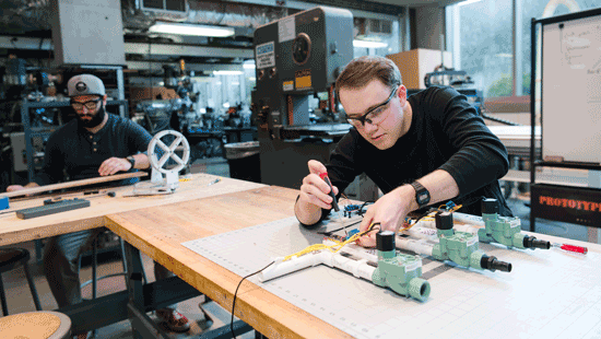 student working in the shop