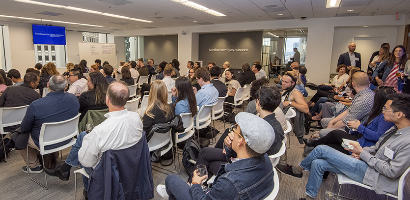 Nearly 100 alumni, students, and members of the public attended the event.