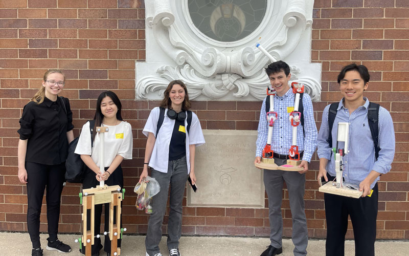 The Segal summer intern team behind OSCAR, pictured left to right: Madeline Conter (‘27), Candy Mei (‘26), Claire Ortiz-Witter (‘26), Elliot Opel (‘25), and Nick Visuthikosol (‘26). Not pictured: Molly Adams (‘25).