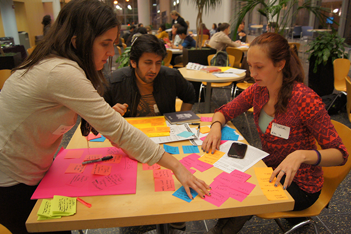 EDI and IPD students collaborate on secondary research during the 3rd Annual Design Challenge. 