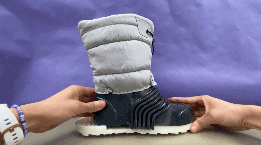 The Sno-Gro Boot has an "accordion" bellows that allows the boot to stretch. Photo credit: Callista Sukohardjo